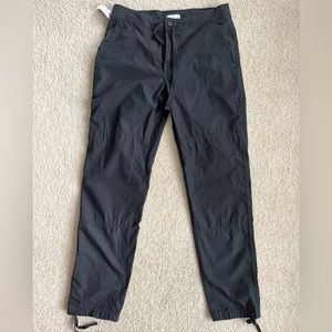 Aritzia TNA PADMA pants, black. Cotton with optional ankle ties. New with tags.